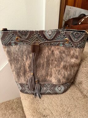 Wild goose cinched bucket bag